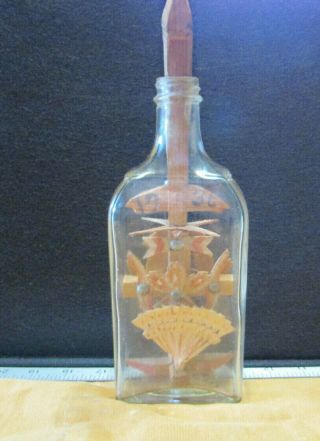 Vintage Folk Art Carved Wood In A Bottle Trick Stopper Tramp Glass