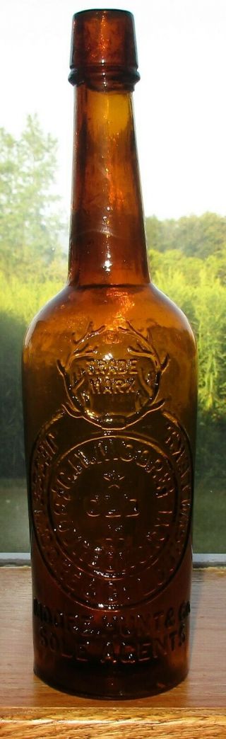 1876 Jesse Moore Moore Hunt Sole Agents Amber Western Whiskey Bottle Appld Top