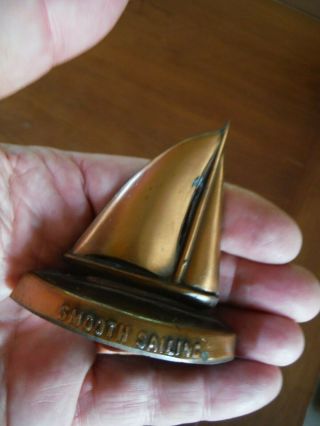 Crane & Breed Casket Co.  Metal Sailboat Paperweight - Old &