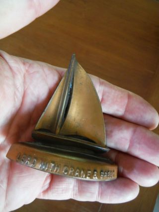 CRANE & BREED CASKET CO.  METAL SAILBOAT PAPERWEIGHT - OLD & 2