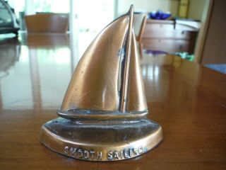 CRANE & BREED CASKET CO.  METAL SAILBOAT PAPERWEIGHT - OLD & 3