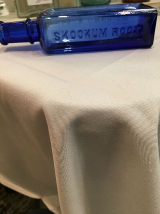 Skookum Root Hair Grower - Cobalt - Western Bottle