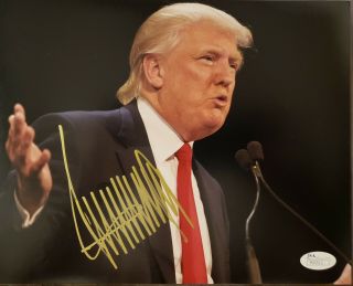 President Trump Autographed 8x10 With Gorgeous Signature In Gold.