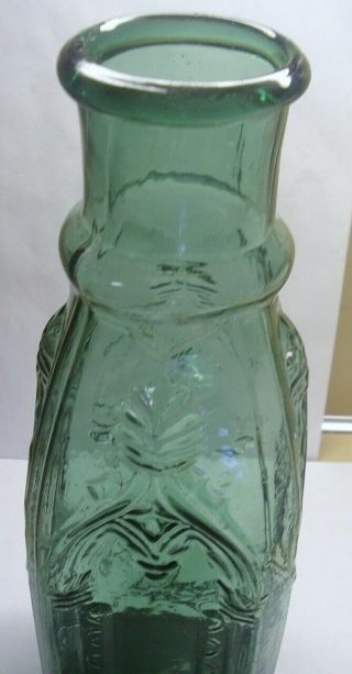 11 1/2  DARK GREEN BLUE EMBOSSED CATHEDRAL PICKLE BOTTLE HEAVY EMBOSSING 10