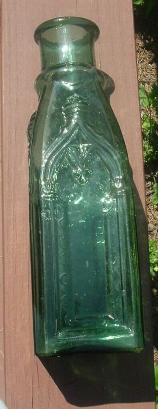 11 1/2  DARK GREEN BLUE EMBOSSED CATHEDRAL PICKLE BOTTLE HEAVY EMBOSSING 4
