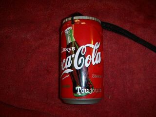 Coca cola 35mm camera,  closes into a can.  Point & Shoot Camera 5