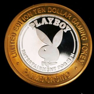2003 S Palms Hotel Casino.  999 Silver Strike $10 Large Playboy Logo Token 0phc09