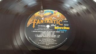 Elton John - Captain Fantastic LP Sleeve signed by Elton John & Bernie Taupin 11