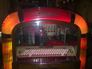Rock - ola Jukebox.  Plays Great,  Lighting And Action On Front.  Ship 10