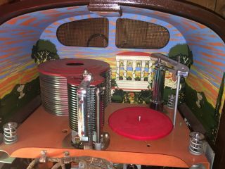 Rock - ola Jukebox.  Plays Great,  Lighting And Action On Front.  Ship 2