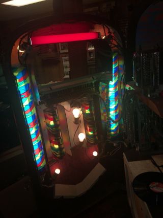 Rock - ola Jukebox.  Plays Great,  Lighting And Action On Front.  Ship 5