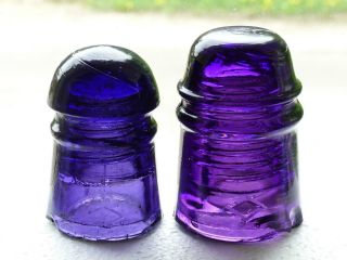 2 Antique Canadian Purple Dominion Glass Insulators