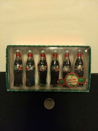 Evolution Santa Christmas Mini Coca - Cola Bottles Rare Collectible Miniatures