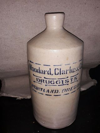 Woodard,  Clarke & Co Druggists Portland,  Oregon Stoneware Jug