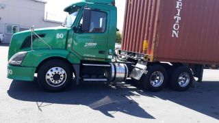 green 2010 tractor truck with 600,  000 miles 7