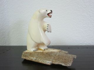 Polar Bear On Driftwood Handcrafted By Joe Kunnuk