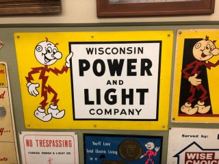 Reddy Kilowatt Wisconsin Power And Light Company Porcelain Sign