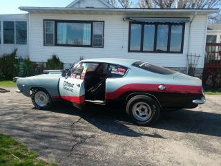 1967 plymouth barracuda car.  Set up for drag racing.  5 point harness,  roll cage. 2