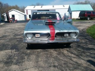 1967 plymouth barracuda car.  Set up for drag racing.  5 point harness,  roll cage. 3