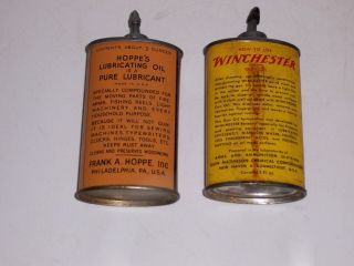 (2) vintage 3 oz.  oval lead top gun oil tins/cans,  Winchester,  Hoppe ' s 2