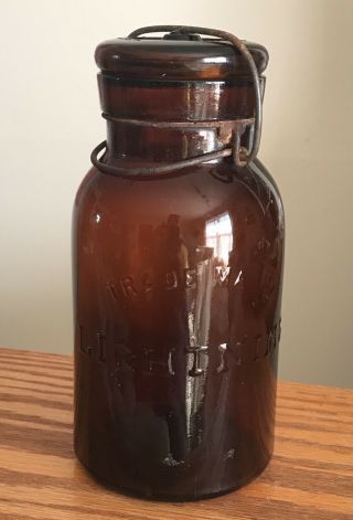 Antique Trade Mark Lightning Amber Glass Fruit Jar Putnam 859