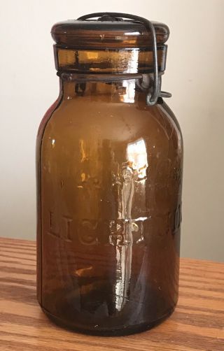 Antique Trade Mark Lightning Amber Glass Fruit Jar Putnam 382
