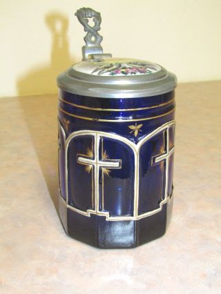 Old German Cobalt Glass Beer Stein With Cross Theme And Hand Painted Lid 5 Inchs