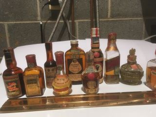 70 miniature very old liquor bottles various brands some with contents 2