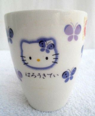 SET OF 6.  HELLO KITTY.  PORCELAIN.  DRINKING GLASS.  JAPAN 1999.  PURPLE BUTTERFLIES 2