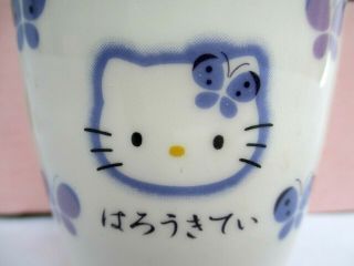 SET OF 6.  HELLO KITTY.  PORCELAIN.  DRINKING GLASS.  JAPAN 1999.  PURPLE BUTTERFLIES 5