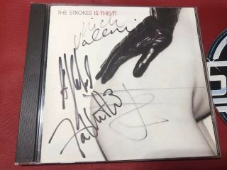 The Strokes Cd Album Is This It.  Signed 100 Autographs Authentic