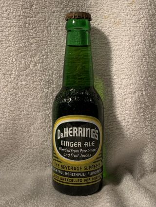 Full 6oz Dr.  Herring’s Ginger Ale Embossed And Acl Soda Bottle