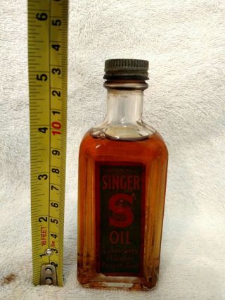 Vintage Singer Oil Embossed 3 Oz Bottle - Full