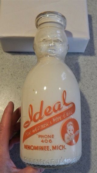 Ideal Dairy Menominee,  Mich Mi Michigan Baby Face Pyroglazed Quart Milk Bottle
