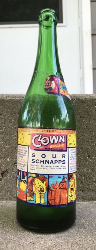 Rock Island,  Illinois 1930s Clown Sour Schnapps Orange Crush Bottling Co.  Bottle