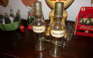 C.  1920 Coca - Cola & Orange Syrup Bottles
