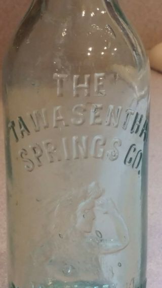 antique the tawasentha springs co cincinnati blob bottle.  embossed indian bust 3