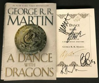 Game Of Thrones Book Signed By Peter Dinklage Kit Harington Emilia Clarke & More