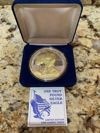 One Troy Pound Silver Eagle.  Limited Addition $200 Gaming Token.  1995 Ballys Las