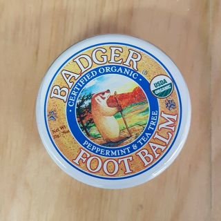 Four Tins Of Assorted Badger Balm Products