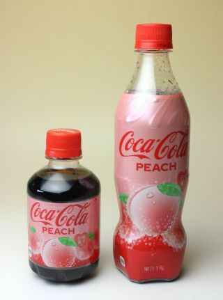 Set Of 2 Coca Cola Peach 500ml 280ml (16.  9oz 9.  5oz) Full Plastic Bottles