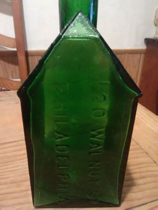 E.  C.  Booz ' s Old Cabin Whiskey Bottle Green Color 1840 120 Walnut St. 3