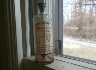 Open Pontil J.  B.  Brown Hannibal,  Mo Rheumatism Liniment Labeled Bottle