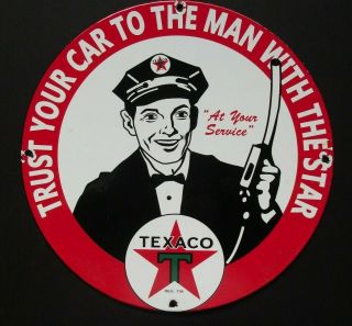 " Trust Your Car To The Man With The Star Texaco " Porcelain Sign,  11 3/4 "