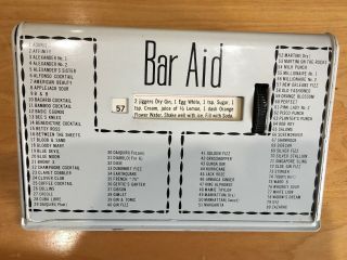 Vintage Old Time Bar Aid,  White Metal With 80 Drink Recipes On Roller