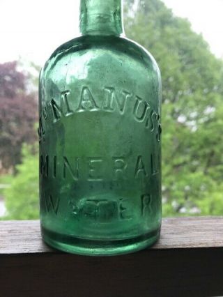 McManus ' s Mineral Water - early open pontiled bottle from (Unknown City/State) 3