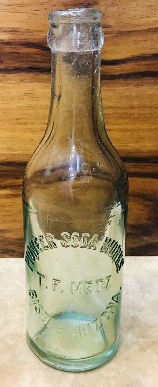 Pioneer Soda,  T.  F.  Metz,  Bisbee,  Arizona Early Crown Top Soda Bottle