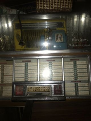 IT ' S A 100 SEEBURG Select - o - matic JUKEBOX WITH OVER 100 45 ' S 7