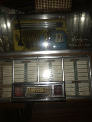 IT ' S A 100 SEEBURG Select - o - matic JUKEBOX WITH OVER 100 45 ' S 8