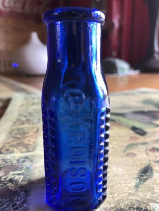 Cobalt Blue H.  K.  Mulford Co.  Skull & Crossbones Poison Bottle